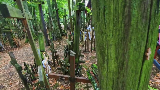 A walk among wooden crosses left by pilgrims on the holy mountain of the Orthodox, Mount Garbarka in eastern Poland. Grabarka, Poland.