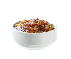 figs jam in a white ceramic  bowl isolated on white background.