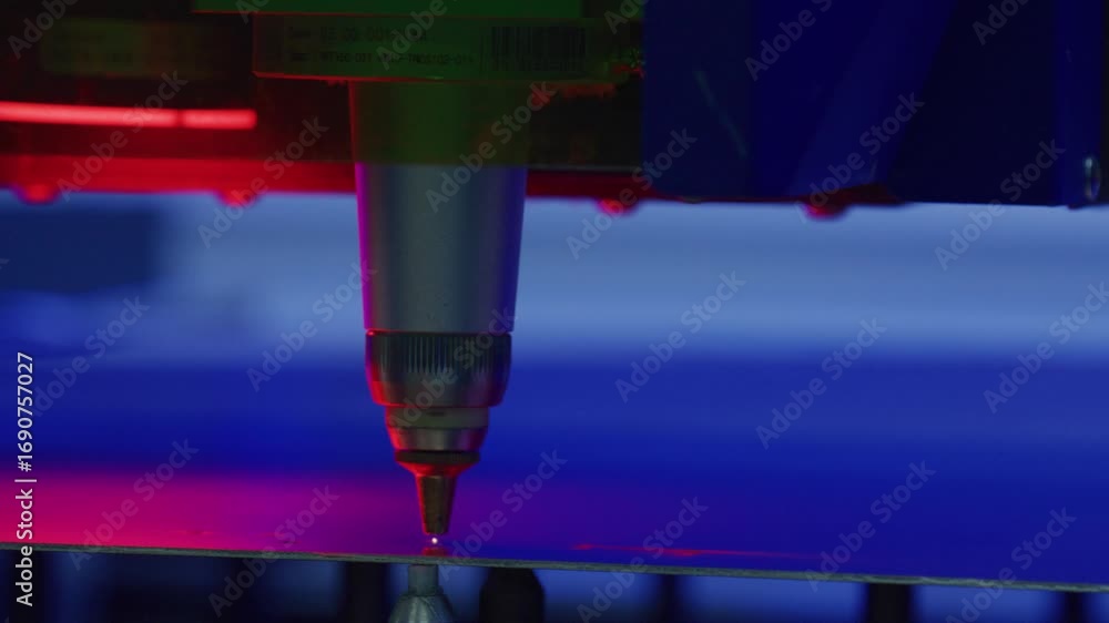 Poster industrial laser engraving machine performing precise metalworking, creating intricate patterns with