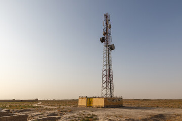 Telecommunication tower in the remote desert landscape of Jowzjan Province Afghanistan