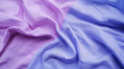 Obraz premium A close-up image of two fabrics, one light purple and one light blue, with a textured appearance.