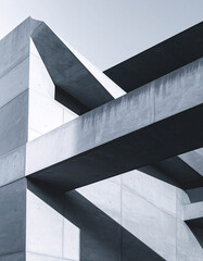Fototapeta premium Monochrome concrete architecture shadows in a modern building a minimalist viewpoint on urban design