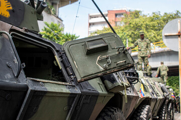 Military tank with open door, Armored vehicle of Colombian army, Armed forces in operation in Colombia. High quality photo
