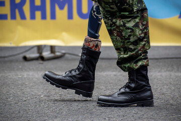 Military with leg prosthesis, Veteran soldier with prosthetic limb, Armed forces and disability in Colombia. High quality photo