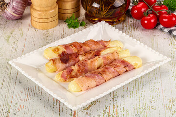 Hot mozzarella sticks with bacon