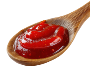 Serving delicious ketchup on wooden spoon kitchen food