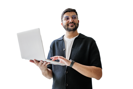 Man happily using a laptop in a relaxed way.