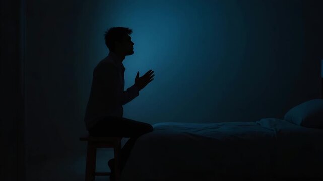 Individual Bows in Night Prayer: Serene Nocturnal Ambiance with Open Hands on Bedside Stool - Photo Stock Concept with Empty Space