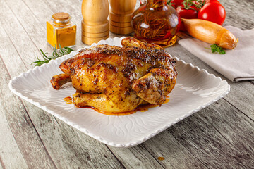 Baked in oven whole chicken with spices