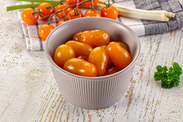 Marinated yellow cherry tomatoes heap