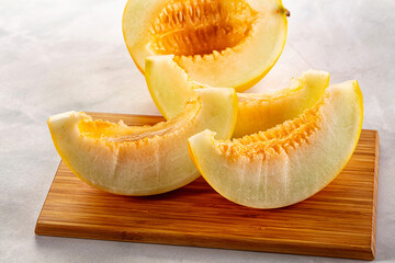 Ripe sweet juicy melon with slices