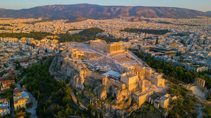 Aerial view around the capitol city Athens and the acropolis in Greece on an early sunny morning in...