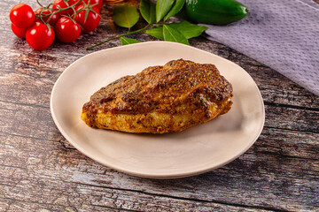 Baked chicken breast with spices and herbs
