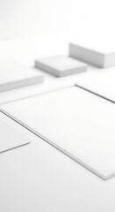 Clean Aesthetic with White Rectangular Objects on a Bright Surface