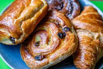 Selection Of Baked Danish Breakfast Pastries Croissant, Cinnamon Swirl, Pain Au Raisin, Choc Au Pain