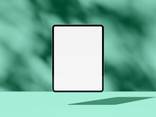 Floating tablet screen mockup with shadow on green blurred background