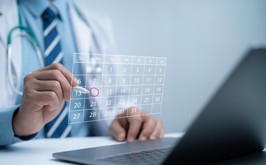 Doctor using laptop with digital calendar hologram marking appointment date representing healthcare scheduling hospital management patient booking system and modern medical technology