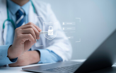 Doctor using laptop with digital shield lock icon and login interface representing healthcare cybersecurity medical data protection privacy compliance and secure technology for hospital systems