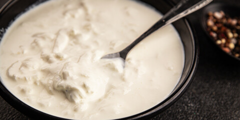 Stracciatella cheese soft young portion size Italian food natural product tasty snack fresh delicious gourmet food background on the table rustic top view copy space