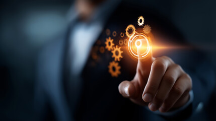 A businessman in a dark suit reaching toward a glowing holographic button bright icons of automation gears spinning outward across a digital interface atmosphere of futuristic