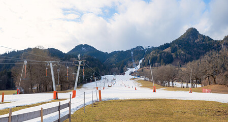 winter sport area Brauneck mountain, with T-Bar lift and chairlift, snow-poor slope