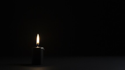 A single candle in the dark.
