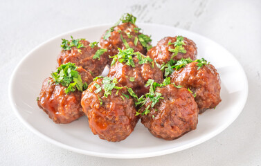 Juicy Spanish Albondigas Served in Tomato Sauce with Fresh Parsley on Top