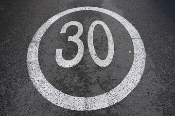 speed limit 30 sign on the road