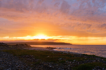 Russia, Murmansk region, Rybachy Peninsula. Sunset on the Barents Sea coast. August 2025