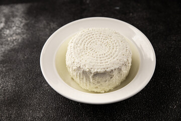 Cottage cheese fermented milk product portion size natural product tasty snack fresh delicious gourmet food background on the table rustic top view copy space keto and paleo diet