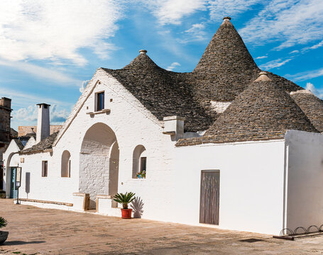 beautiful traditional white houses trulli in italian region Puglia. Trullo is a old masonry house with cone roof with anciant history. World heritage UNESCO