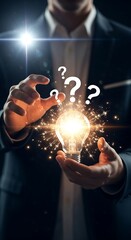Fototapeta premium Man Holding A Glowing Lightbulb With Question Marks Symbolizing Ideas And Creativity