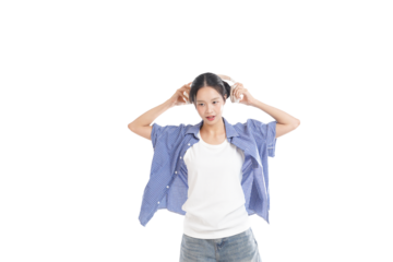 Melody in Her Mind: A young woman immerses herself in the rhythm, cradling headphones and transported by a world of sound, embodying a sense of musical euphoria. 