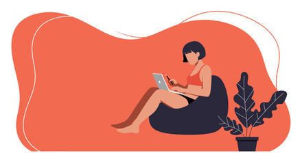 Woman comfortably working from home on a laptop. Depicts remote work, freelance lifestyle, or casual business productivity in a relaxed setting.