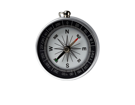 Close-up of a circular compass with a silver metal frame, black markings, and a rotating needle