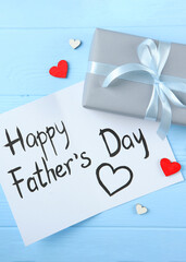 Background to the day of the father on a colored background top view.. Vertical photo format