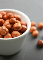 hazelnuts close-up on the table. Minimalism, place for text. Vertical photo format