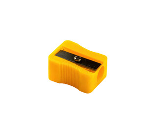 A bright yellow plastic pencil sharpener, rectangular in shape, with a metal blade and a central screw