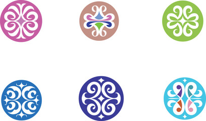 Circular decorative emblems with swirling patterns