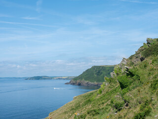 Fototapeta premium green cliffs at lantic bay in cornwall