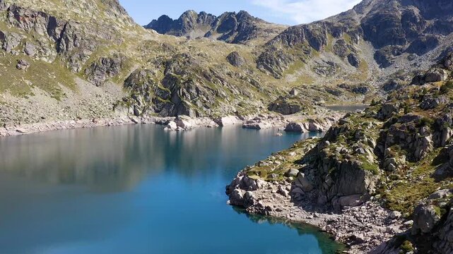Aerial view of the beautiful pond of Juclar, in the litle country-side of the Pyrenes, Andorra.