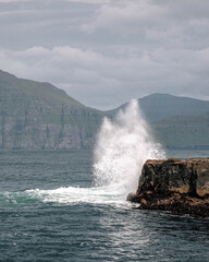 waves crashing on rocks