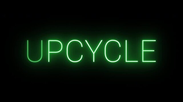 Flickering neon green Upcycle sign animated on black background.
