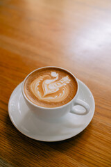 Latte art coffee in a white mug
