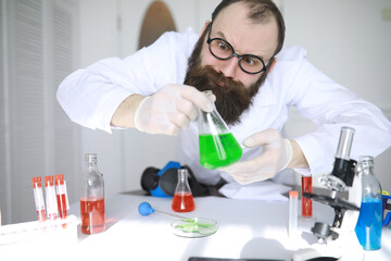Chemist crazy. A mad scientist conducts experiments in a scientific laboratory. Performs research...
