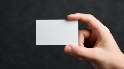 Pixel Perfect Image of Isolated Hand Holding Business Card.
