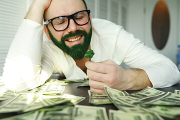 A man with a green beard. St.Patrick 's Day. Irish fan color beard.