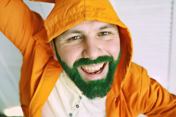 Happy saint patricks day. A man with a green beard. St.Patrick 's Day. Irish fan color beard.