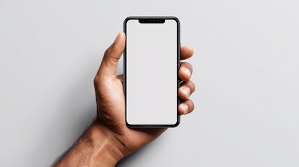 ultra puality image Top View Mockup Image Hand Using a Smartphone Man Holding Cell Phone with Blank Screen.
