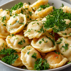 Delicious pierogi dumplings generously topped with fresh chopped parsley